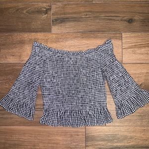 Fitted off the shoulder top with ruffle hem